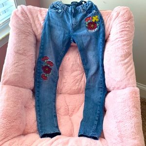 Jeans, cute medium wash with flowers on them